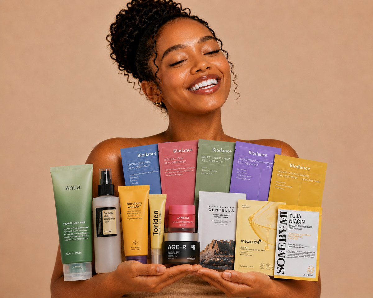 Glow Fidence customer holding a curated set of K-beauty skincare products
